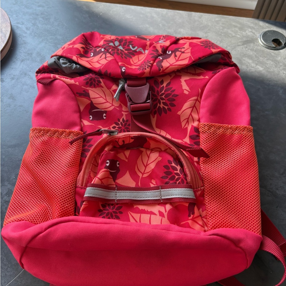 Sporty Red Backpack with Drawstring Closure and Water-Resistant Material